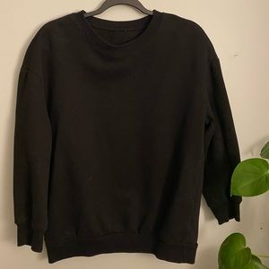 Black crewneck.